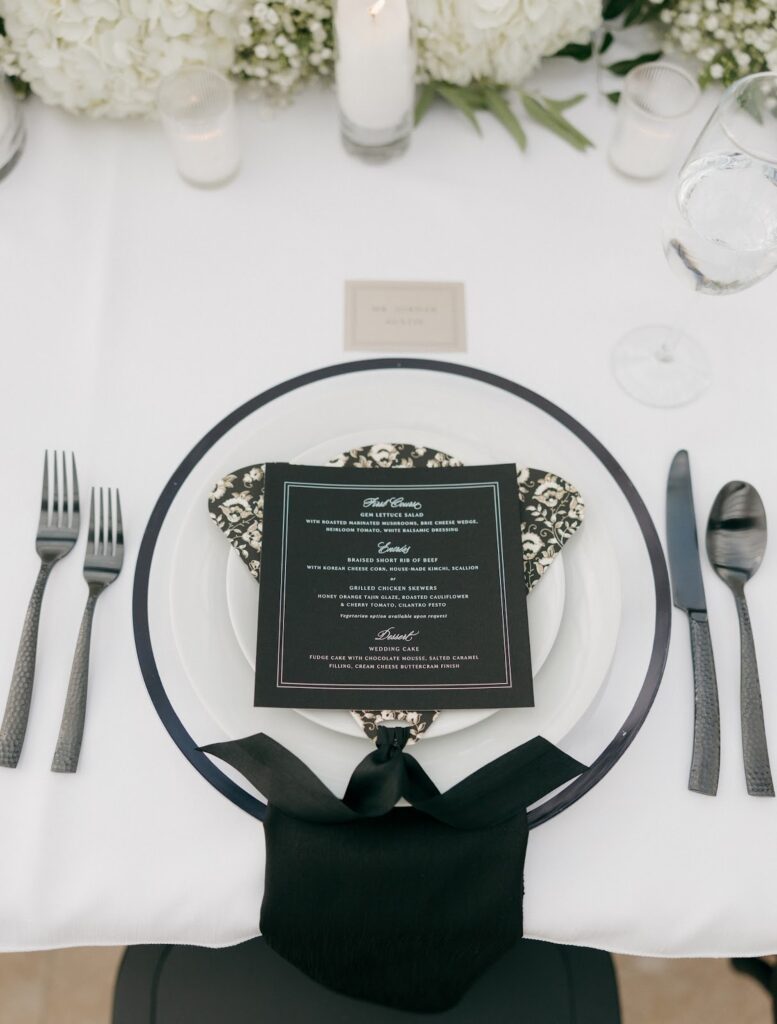 luxury black and white styled wedding tablescape